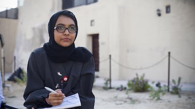 The Journey of the Union, a programme organised by Al Bayt Mitwahid, moved on to Umm Al Quwain. Seen here drawing is Sheikha Al Bayraq. Lee Hoagland/The National.