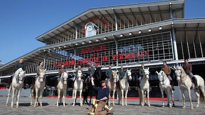 Bartabas, the acclaimed trainer and founder the national equestrian academy of Versailles, with horsemen in 2013. Thomas Samson / AFP