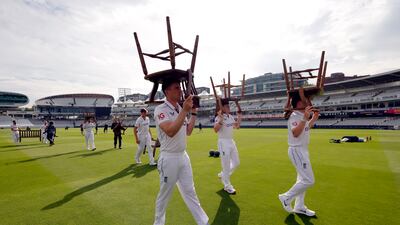 England cricketers, among them Dan Lawrence and Matthew Potts, ahead of a nets session at Lord's, London. PA