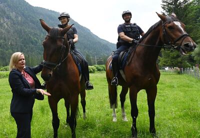 German Interior Minister Nancy Faeser, left, inspects the security operation around the G7 summit in Bavaria. AFP