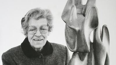 Saloua Raouda Choucair with one of her sculptures. Courtesy of Agial Art Gallery / Saloua Raouda Choucair Foundation