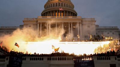 Supporters of Donald Trump riot in front of the US Capitol building on January 6, 2021. Reuters