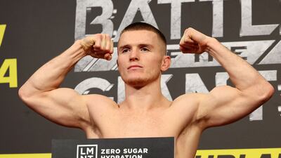 Paul Hughes, above, takes on AJ Mckee in the lightweight division