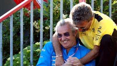 Eddie Jordan with Flavio Briatore. Jordan passed away after battling an aggressive form of cancer. PA