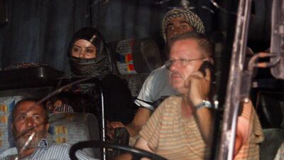 A bus that is part of a convoy carrying ISIL fighters and their families prepares to depart from Qalamoun, near the Syrian border with Lebanon, on August 28, 2017. Omar Sanadiki / Reuters