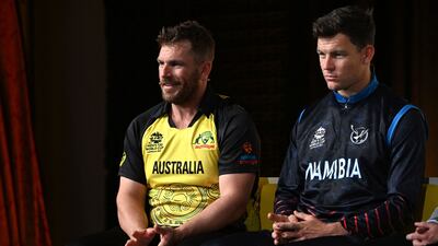 Australian captain Aaron Finch with Namibia's captain Gerhard Erasmus in Melbourne. AFP
