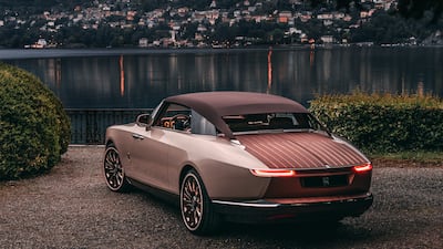 The rear deck is swathed in a walnut veneer.