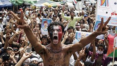 A protester joins a rally in the capital in September, with an slogan in Arabic on his chest that says: “Don’t think that youth will be defeated”.