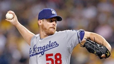 Los Angeles Dodgers starting pitcher Chad Billingsley throws to a Pittsburgh Pirates batter