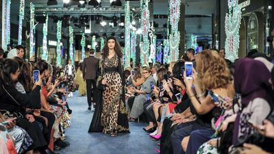 Models walk up and down the catwalk during the Dolce & Gabbana Fashion Show at Dubai Mall.