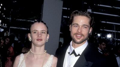 1992: Brad Pitt's first Oscars. The young actor proved that monochrome tuxedos need not be classic or boring with his black cross tie at the 64th Annual Academy Awards on March 30, 1992. Pitt is seen here with then-girlfriend, Juliette Lewis. Getty Images