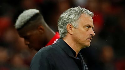 Front: Jose Mourinho has stripped Paul Pogba, back, of the Manchester United vice captaincy, but has denied a fallout with his player. Reuters