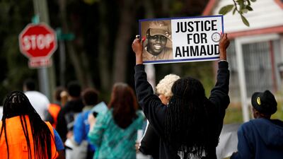 People march demanding justice for Ahmaud Arbery in Brunswick, Georgia, on November 4, 2021. Reuters