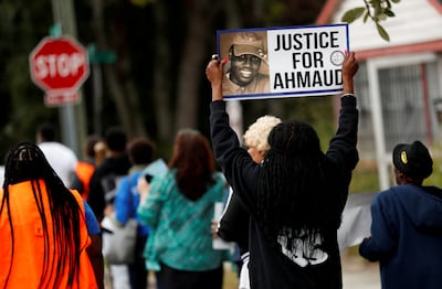 People march demanding justice for Ahmaud Arbery in Brunswick, Georgia, on November 4, 2021. Reuters
