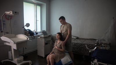 Volodymyr assists his wife Anastasia, as she has contractions before the birth of their first baby, at a maternity hospital in Zaporizhzhia, in September 2023. Ukraine’s birth rate since the start of the war the country's birth rate has plummeted by 28 per cent. Getty Images