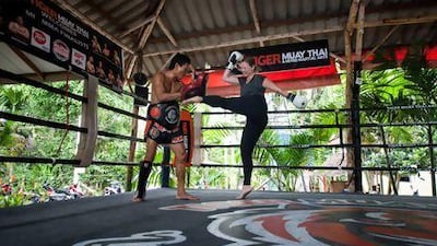Laura Koot trains with Big Nong at Tiger Muay Thai in Phuket, Thailand. Photo by Mitch Viquez