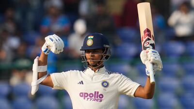 India's Yashasvi Jaiswal celebrates after reaching his hundred against the West Indies at the Arun Jaitley Stadium in Delhi. AP