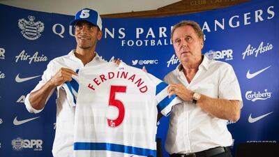 Manager Harry Redknapp, right, is hoping that Rio Ferdinand, left, is an example of Queens Park Rangers spending wisely and not a repeat of what happened in the 2012/13 season when QPR’s big money players did not pan out and they were relegated. The club are approaching their return to the English Premier League with a different tact this time around. Leon Neal / AFP
