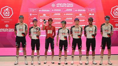Team UAE Emirates' riders and red jersey winner Isaac Del Toro Romero ready for the final stage. AFP