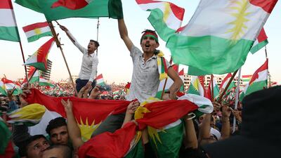 Kurds hold Kurdish flags as they take part in a rally for the Kurdistan independence referendum campaign at the Franso Hariri stadium in Erbil, Iraq, on September 22, 2017. Mohammed Messara / EPA