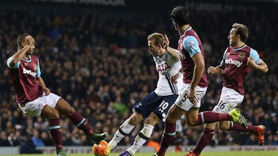 Harry Kane scores the third goal for Tottenham Hotspur against West Ham United. Matthew Childs / Reuters