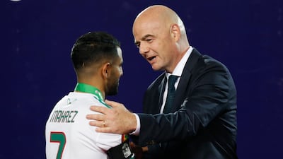 Fifa president Gianni Infantino, greets Algeria's Riyad Mahrez, after the African Cup of Nations final. AP