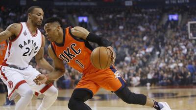 Mar 28, 2016; Toronto, Ontario, CAN; Oklahoma City Thunder guard Russell Westbrook (0) drives to the net against Toronto Raptors guard Norman Powell (24) during the first half at the Air Canada Centre. Mandatory Credit: John E. Sokolowski-USA TODAY Sports