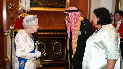 Queen Elizabeth II greets the ambassador of Kuwait at an evening reception for members of the diplomatic corps at Buckingham Palace in 2018. Getty