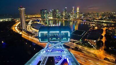 The Singapore Flyer overlooks the city. Guowen Wang / Getty Images / Flickr RF