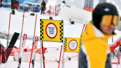 A sign placed on the snow indicating a closed ski slope section in Saalbach-Hinterglemm, Austria. AFP