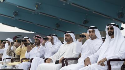 From right: Mohamed Ahmad Al Bowardi, Minister of State for Defence Affairs, Sheikh Khaled bin Zayed, Chairman of the Board of Zayed Higher Organisation for Humanitarian Care and Special Needs, Sheikh Hamed bin Zayed, Chairman of the Crown Prince Court of Abu Dhabi, Sheikh Saif bin Zayed, Deputy Prime Minister and Minister of Interior, Sheikh Nahyan bin Zayed, Chairman of the Board of Trustees of Zayed bin Sultan Al Nahyan Charitable and Humanitarian Foundation, and Sheikh Hamdan bin Zayed, Ruler’s Representative in the Western Region of Abu Dhabi, watch the the Armed Forces put on a show. Ryan Carter / Crown Prince Court - Abu Dhabi