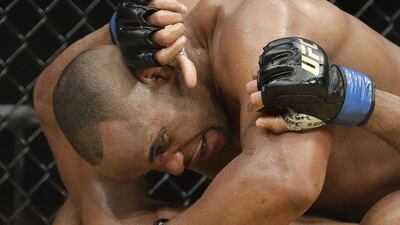 Daniel Cormier, top, pressure Anderson Silva during their light heavyweight bout at UFC 200, Saturday, July 9, 2016, in Las Vegas. John Locher / AP Photo