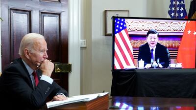 US President Joe Biden meets China's President Xi Jinping during a virtual summit this month. AFP