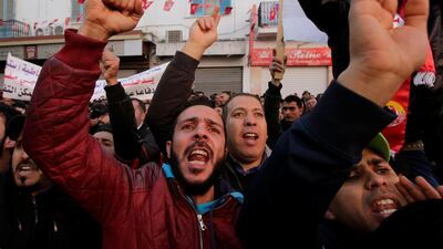 Tunisians shout slogans during demonstrations on the seventh anniversary of the toppling of president Zine El Abidine Ben Ali in Tunis on January 14, 2018. Youssef Boudlal / Reuters