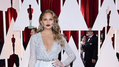 Chrissy Teigen arrives for the 87th annual Academy Awards ceremony at the Dolby Theatre in Hollywood on February 22, 2015. Paul Buck / EPA
