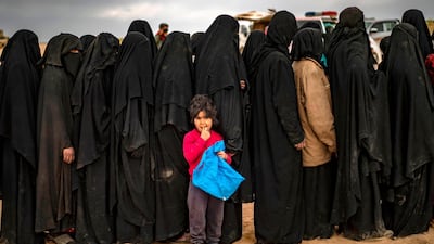 Women and children at the screening area. AFP