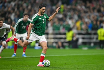 Mexico's Raul Jimenez scores from the penalty spot to make it 3-2. AFP