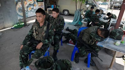 Army chief General Prayuth Chan-ocha said the military was taking charge of public security because of violent protests that had claimed lives and caused damage. Nicolas Asfouri / AFP Photo