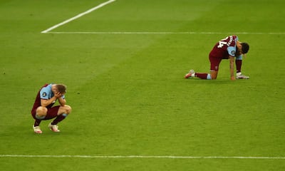 Ryan Fredericks, right, and Jarrod Bowen after West Ham's loss to Tottenham. EPA