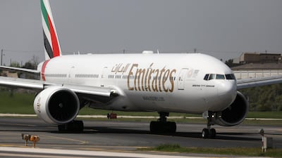 An Emirates Airlines Boeing 777-300ER prepares to take off. REUTERS