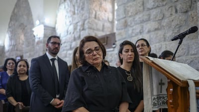 Mourners attend the funeral of Sliman Mansour at St Peter's Church in Birzeit in the occupied West Bank. AFP
