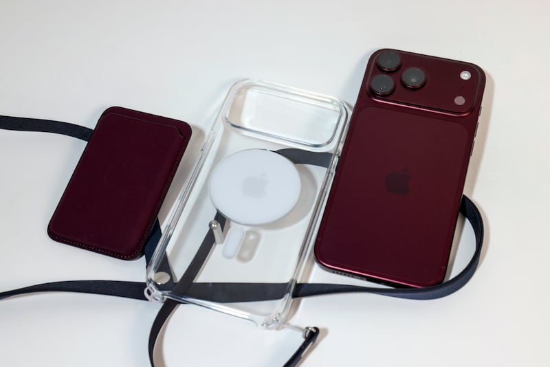 The Apple iPhone 18 Pro Max with new versions of a fine-woven wallet, MagSafe clear case and cross-body strap. Victor Besa / The National