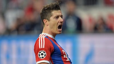Bayern Munich's Robert Lewandowski celebrates scoring their third goal against FC Porto in advancing to the Champions League semi-finals on Tuesday. Peter Kneffel / EPA