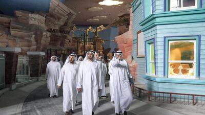 Sheikh Mohammed bin Zayed, together with Mohammed Al Mubarak, and Mohammed Abdalla Al Zaabi CEO of Miral walk through Warner Bros World Abu Dhabi on Yas Island. Ryan Carter for the Crown Prince Court - Abu Dhabi