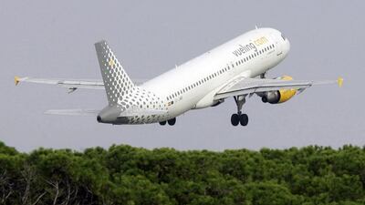 A Vueling aircraft takes off at Barcelona airport. The airline is based in Barcelona. Josep lago / AFP