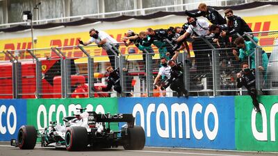Mercedes team members celebrate Lewis Hamilton winning in Hungary. Getty