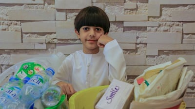 Ghaith Ismail is a 9-year-old Emirati who is always happy to help. Victor Besa for The National