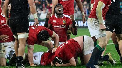 British & Irish Lions' lock Maro Itoje, centre, celebrates winning the second rugby union Test against the New Zealand All Blacks in Wellington on July 1, 2017.