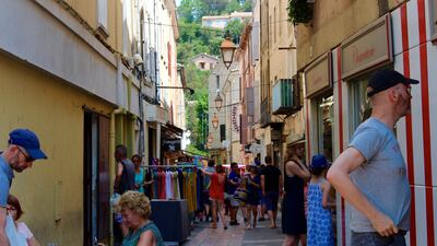 Shoppers on holiday flock to markets in the south of France for bargains. Holly Aguirre / The National