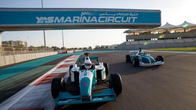 The Formula Yas 3000 race cars on track in Abu Dhabi. Yas Marina Circuit